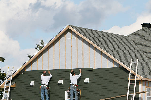 Professional Siding Installation technician working in Brownsville, KY